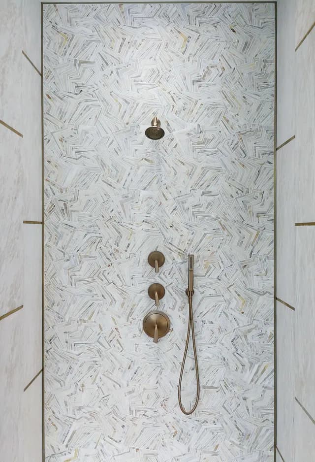 Luxury bathroom with vertical marble veining pattern