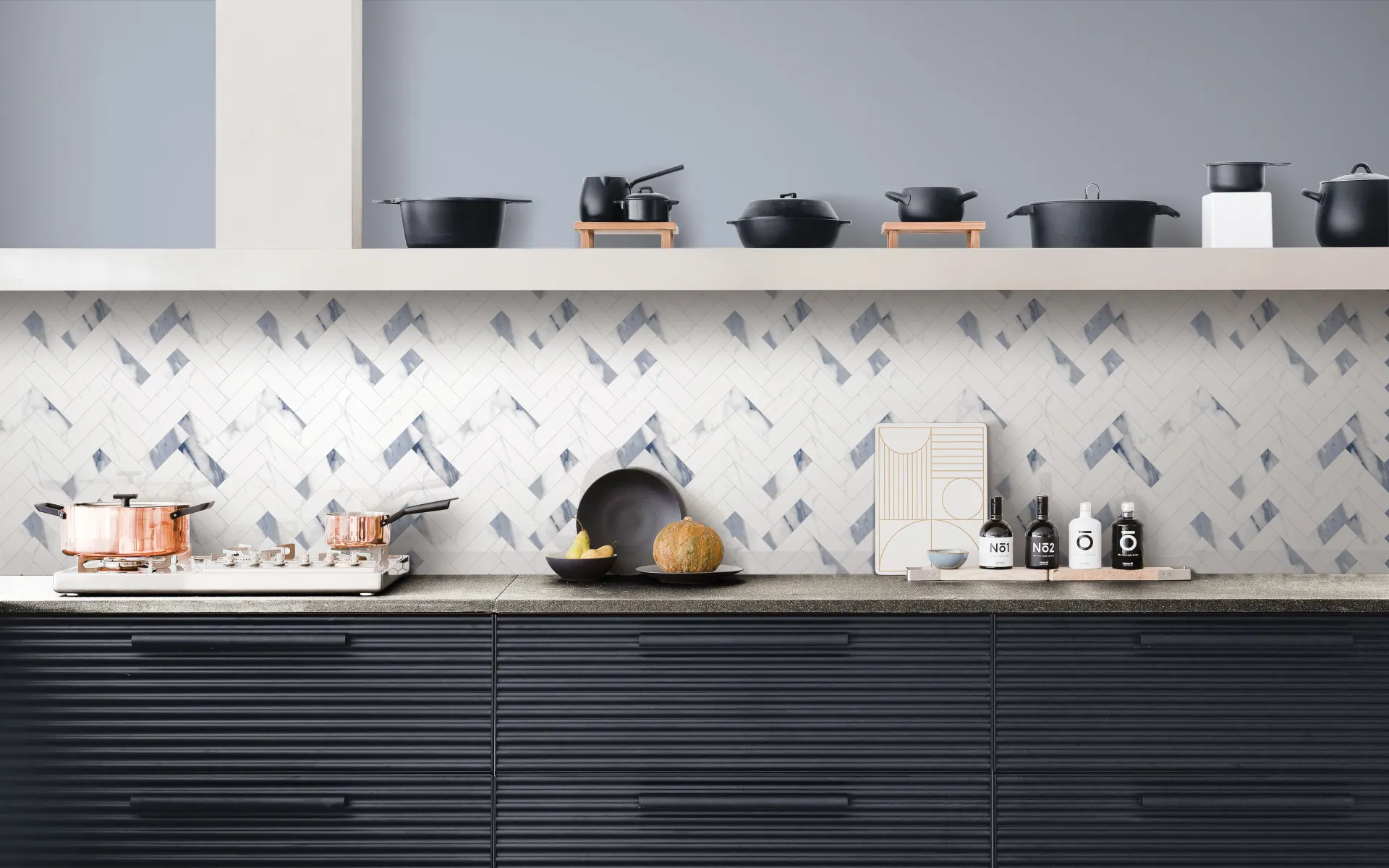 Blue herringbone pattern kitchen backsplash design