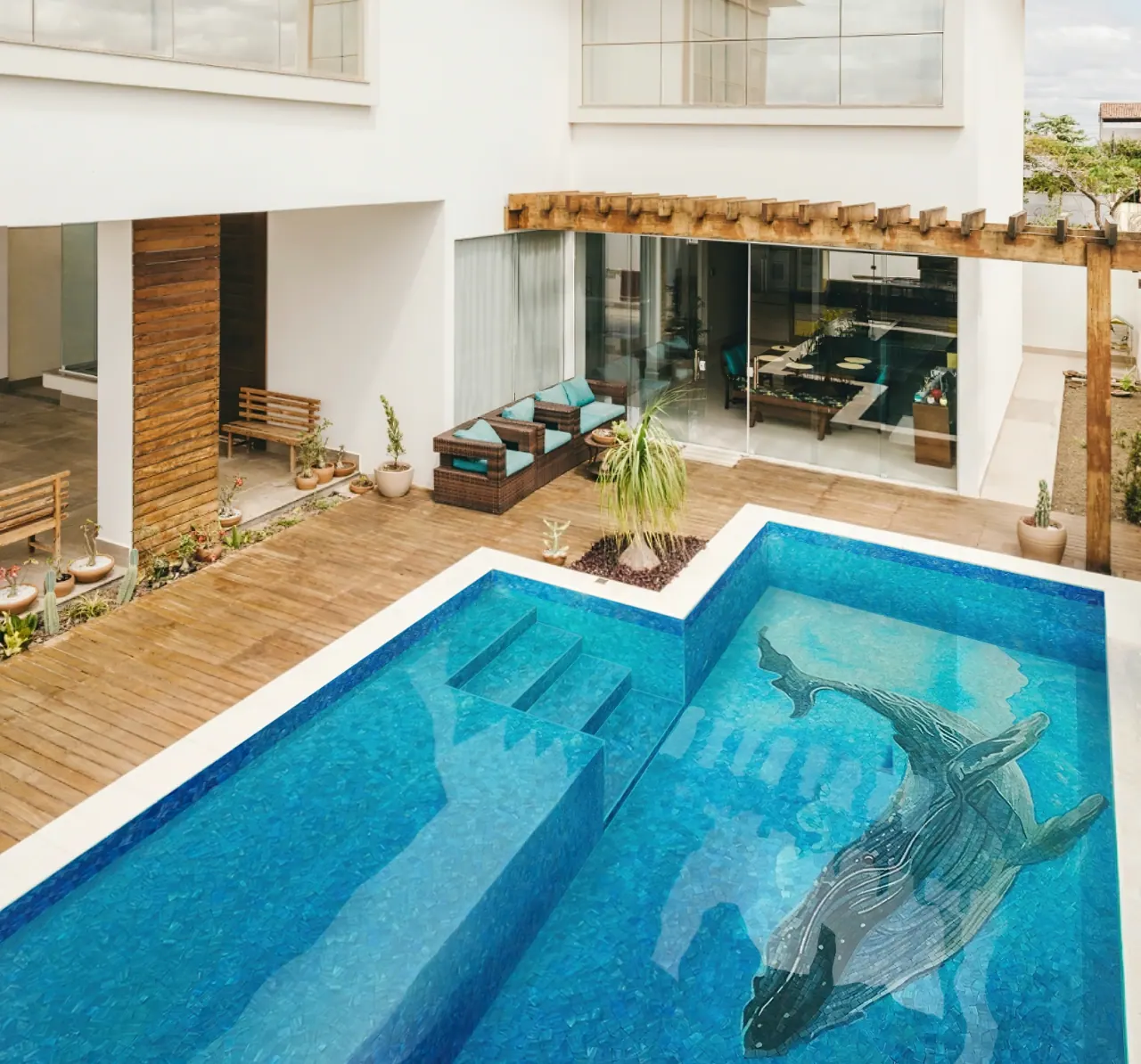 Luxury indoor pool with iridescent mosaic tiles