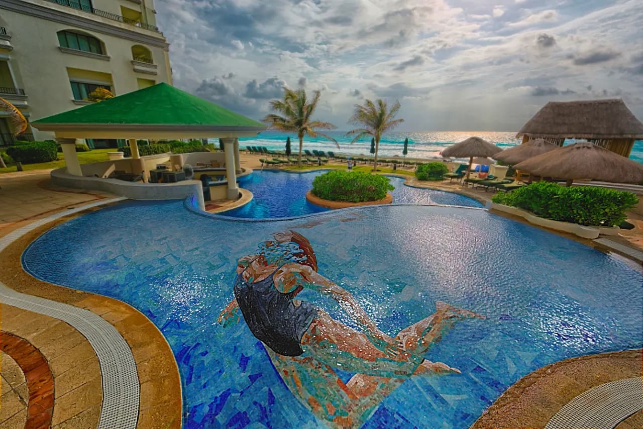 Boutique hotel pool with designer tile patterns