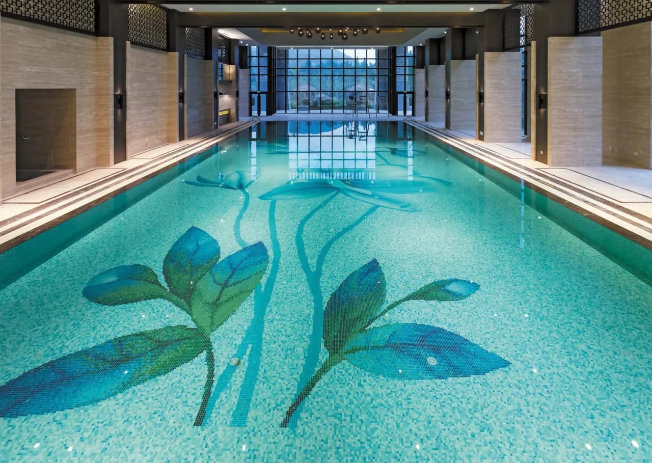 Luxury villa pool with cascading water feature